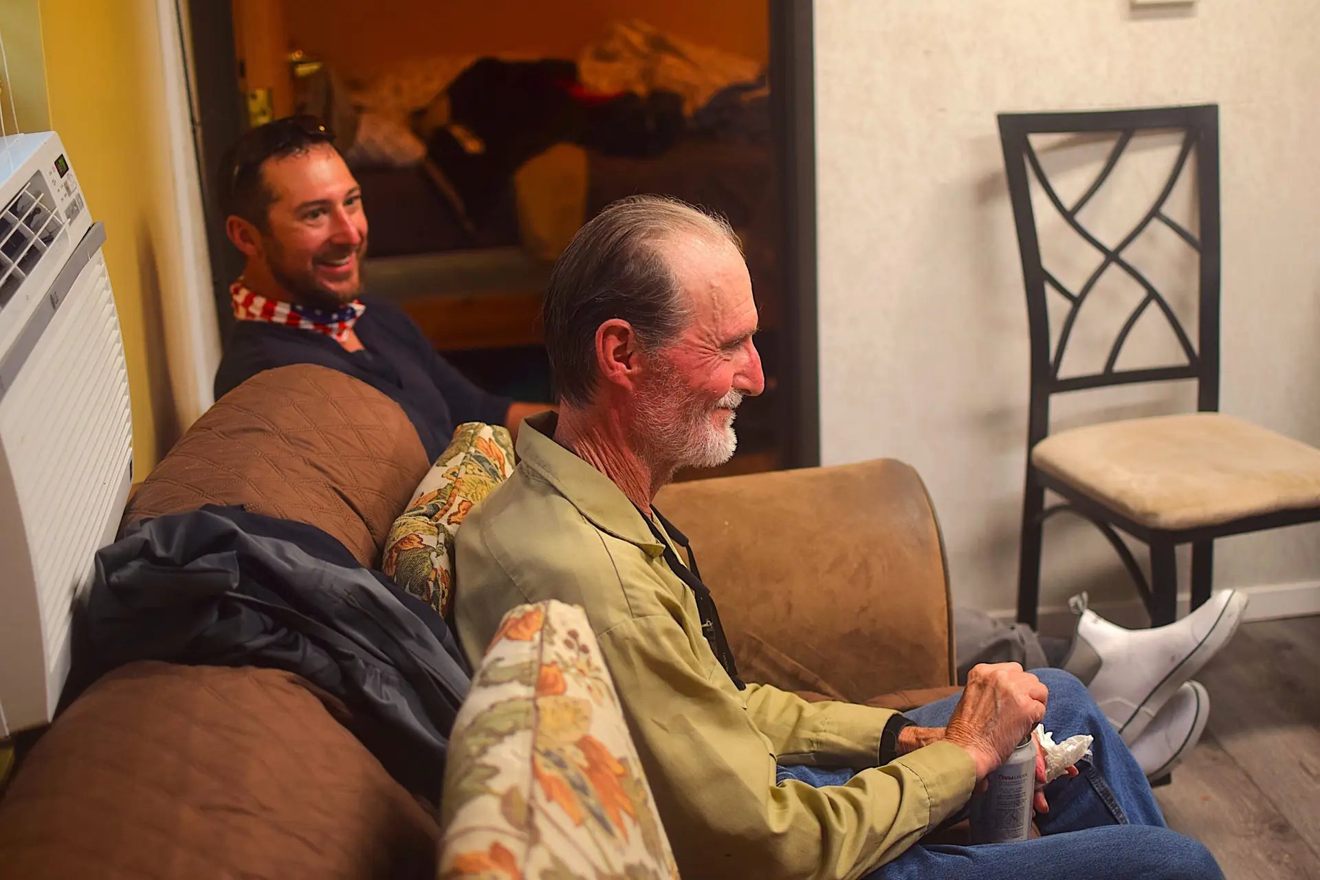 Old friends trading stories in the cabin